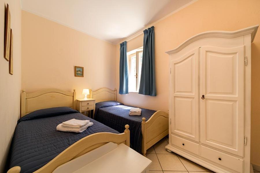 Residence Vacanza Mare Марина-ди-Кампо Экстерьер фото